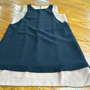 Mark. Brand tan and black sleeveless dress.  Size Medium. Great condition
